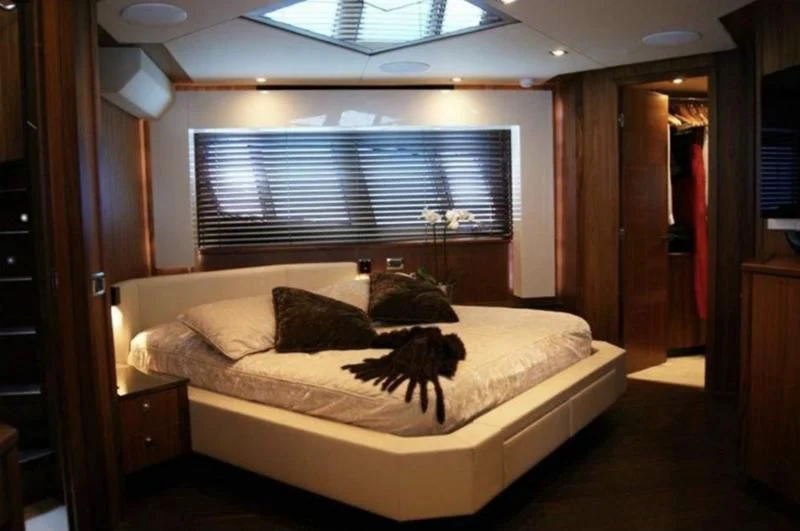 a group of cats on a bed aboard CODE Yacht for Sale