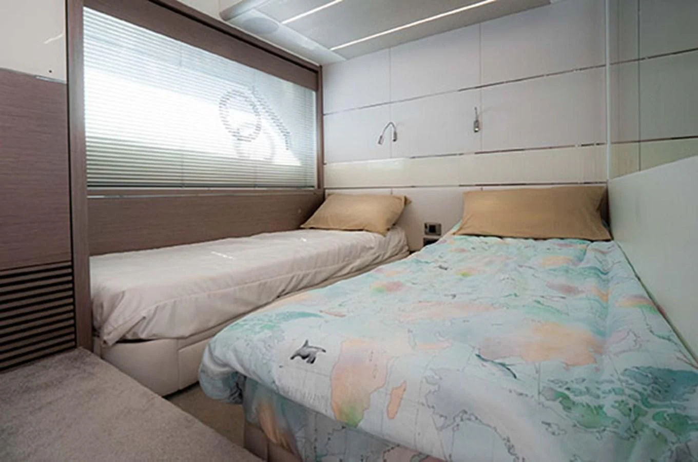a couple of beds in a room aboard VALERIA Yacht for Sale