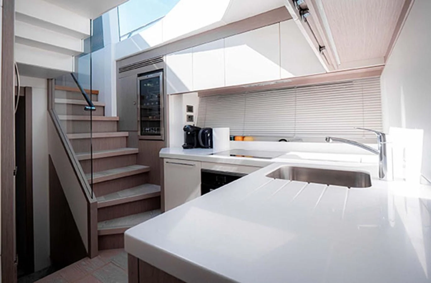 a kitchen with a white countertop aboard VALERIA Yacht for Sale
