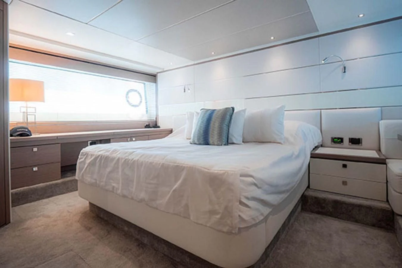 a room with a bed and a window aboard VALERIA Yacht for Sale