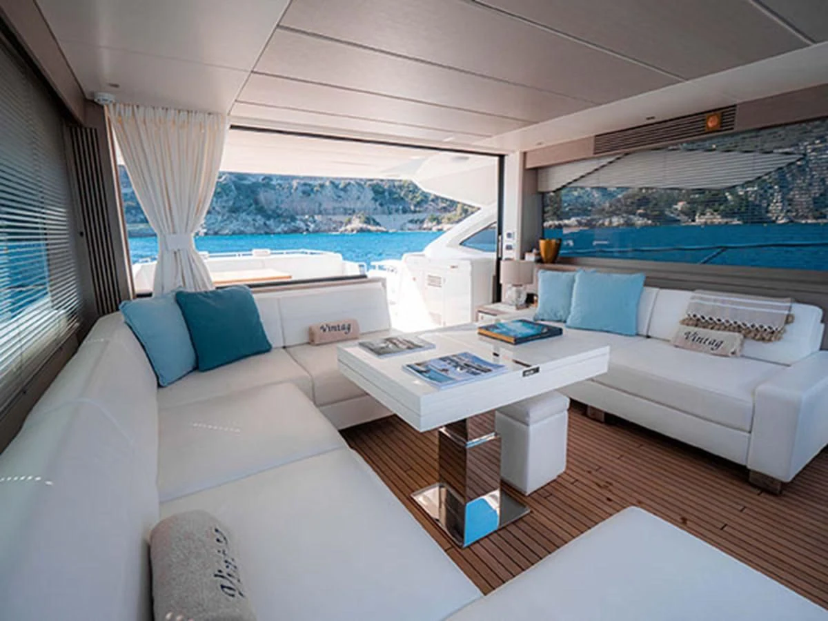 a room with a couch and a table aboard VALERIA Yacht for Sale