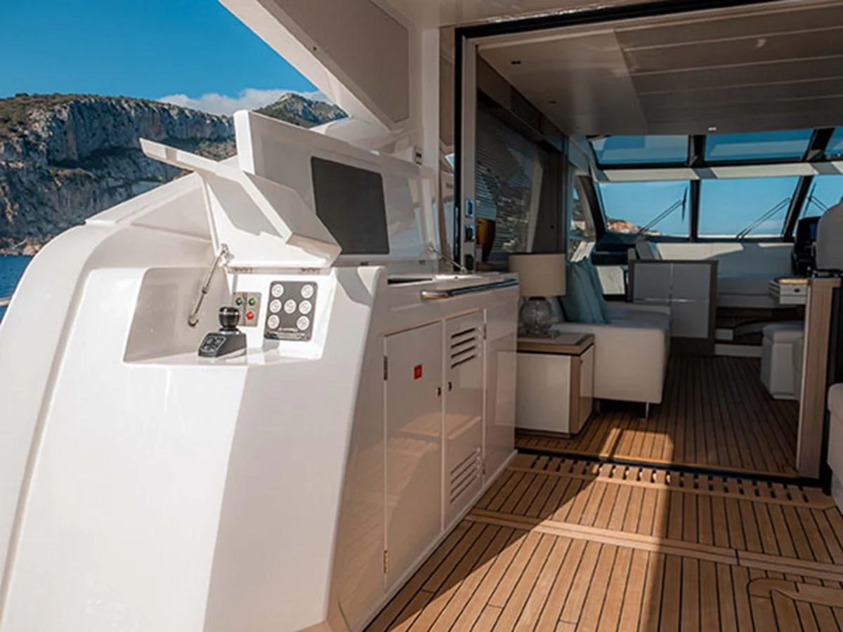 a room with a large white counter and a wood floor aboard VALERIA Yacht for Sale