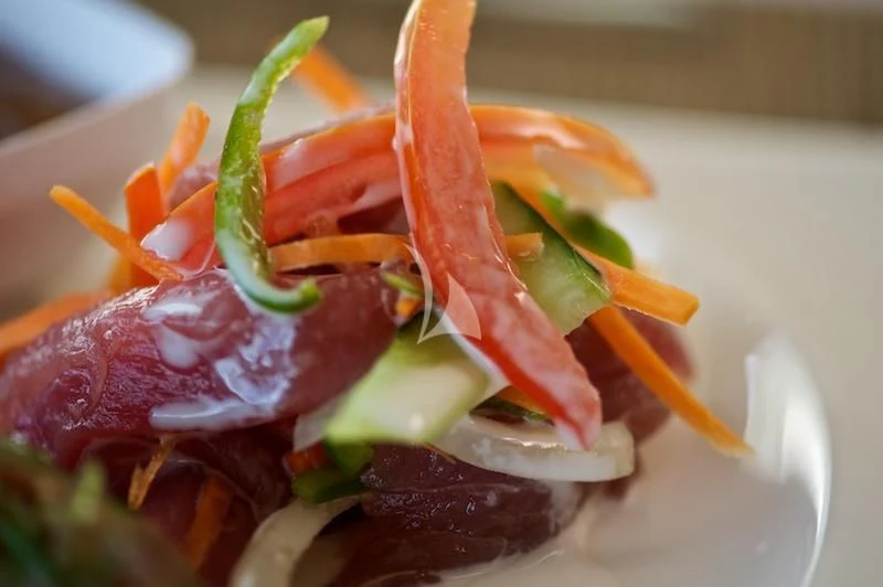 a plate of food aboard MISS KULANI Yacht for Charter