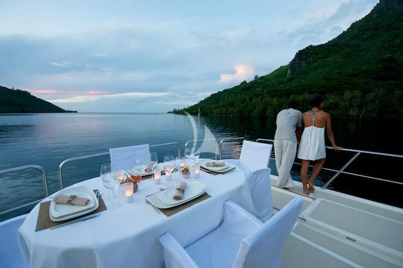 a couple on a boat aboard MISS KULANI Yacht for Charter