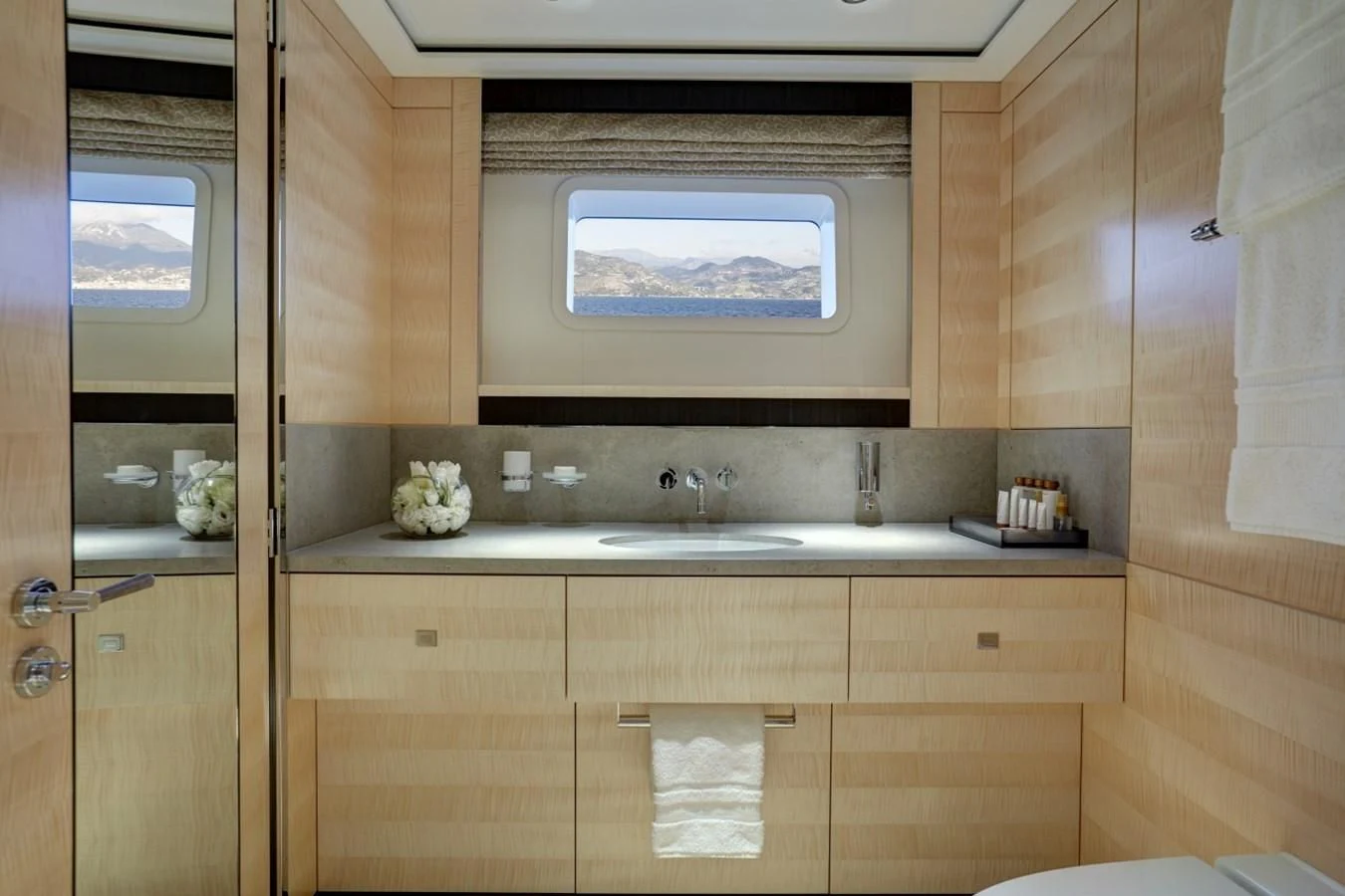 a bathroom with a large window aboard LADY VICTORIA Yacht for Sale