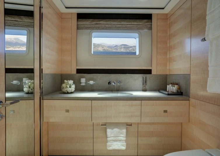 a bathroom with a large tv aboard LADY VICTORIA Yacht for Sale