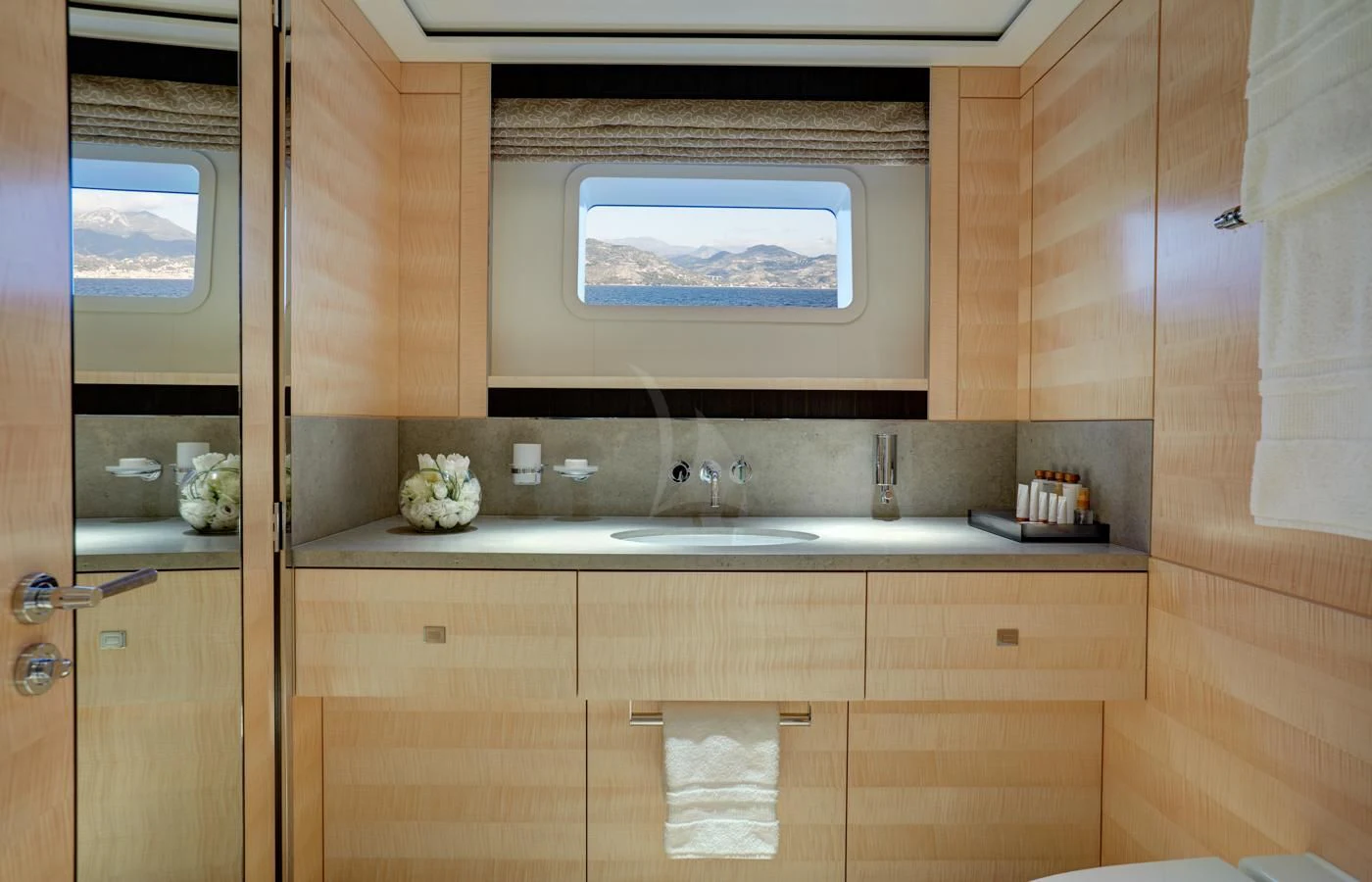 a bathroom with a large window aboard LADY VICTORIA Yacht for Sale