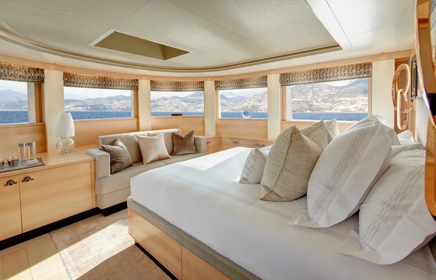a large white bed in a room aboard LADY VICTORIA Yacht for Sale