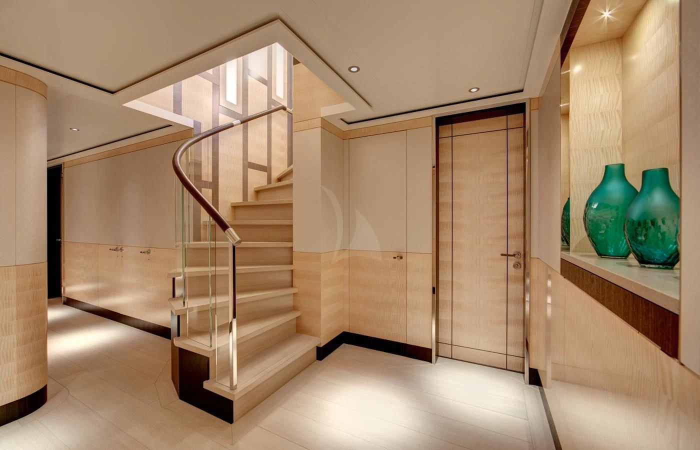 a room with a staircase and vases on the shelves aboard LADY VICTORIA Yacht for Sale