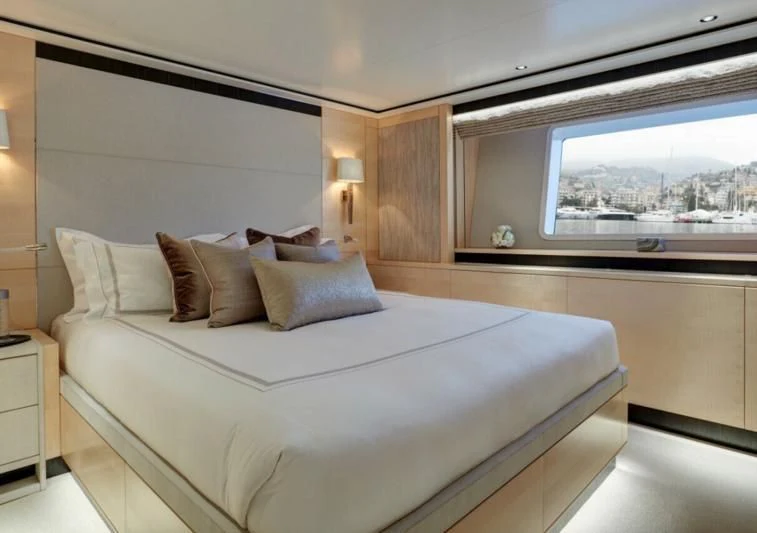 a bed in a room aboard LADY VICTORIA Yacht for Sale