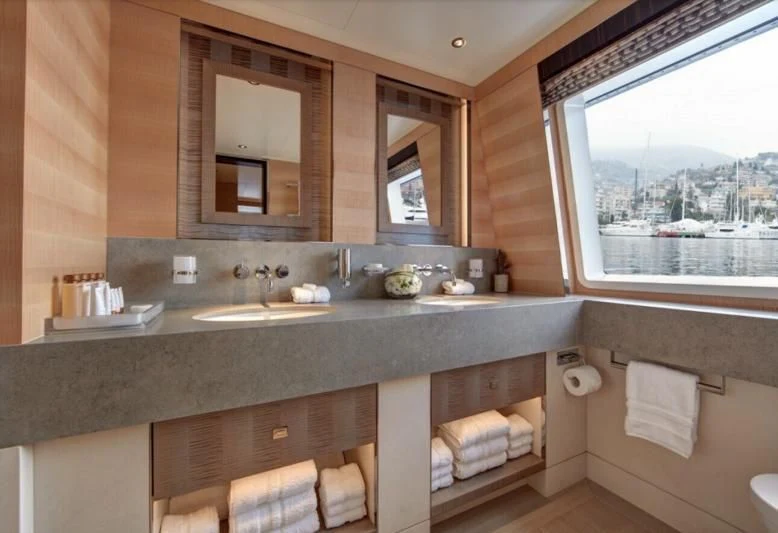a bathroom with a large window aboard LADY VICTORIA Yacht for Sale