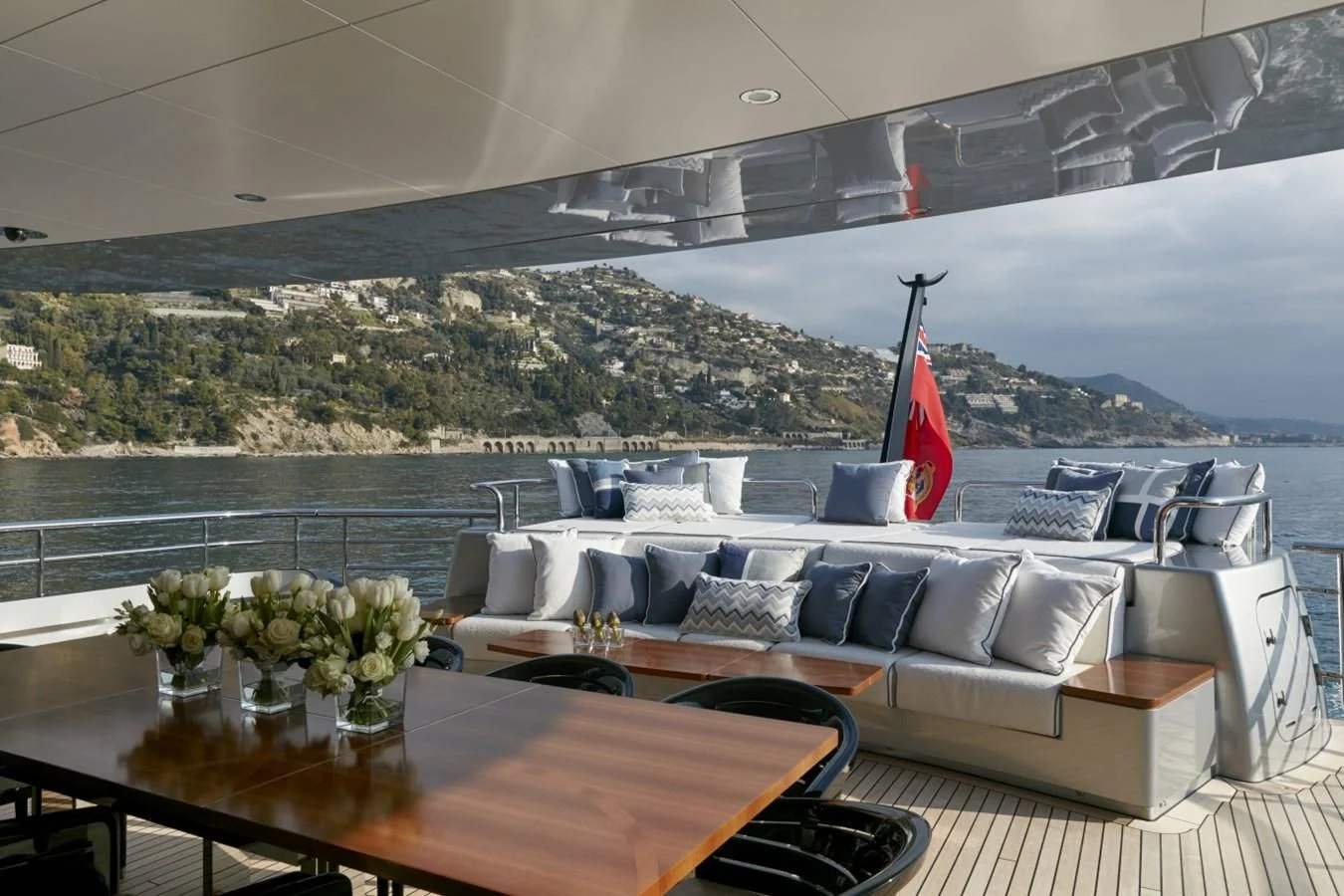 a room with a table and chairs aboard LADY VICTORIA Yacht for Sale