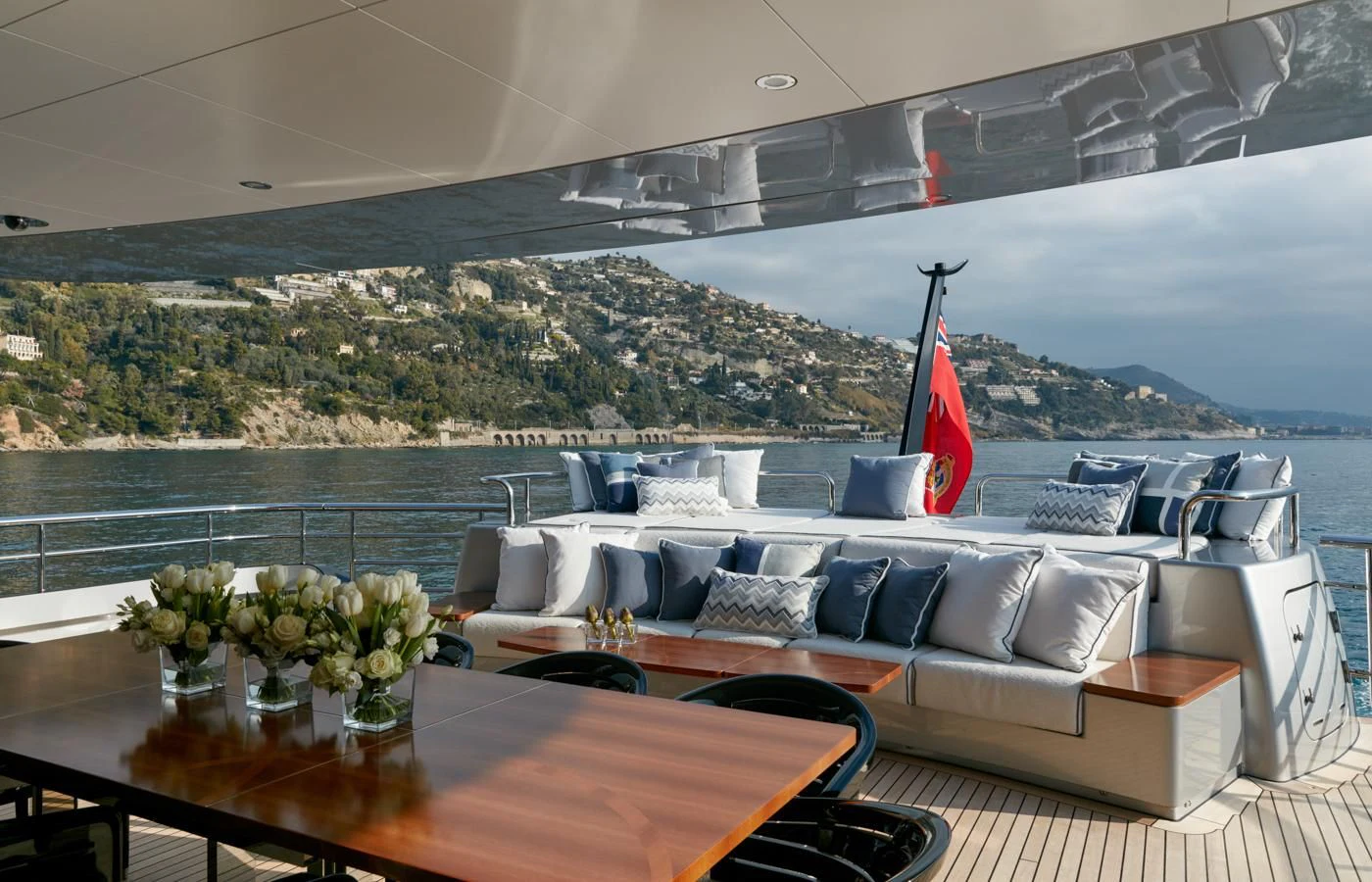 a room with a table and chairs aboard LADY VICTORIA Yacht for Sale