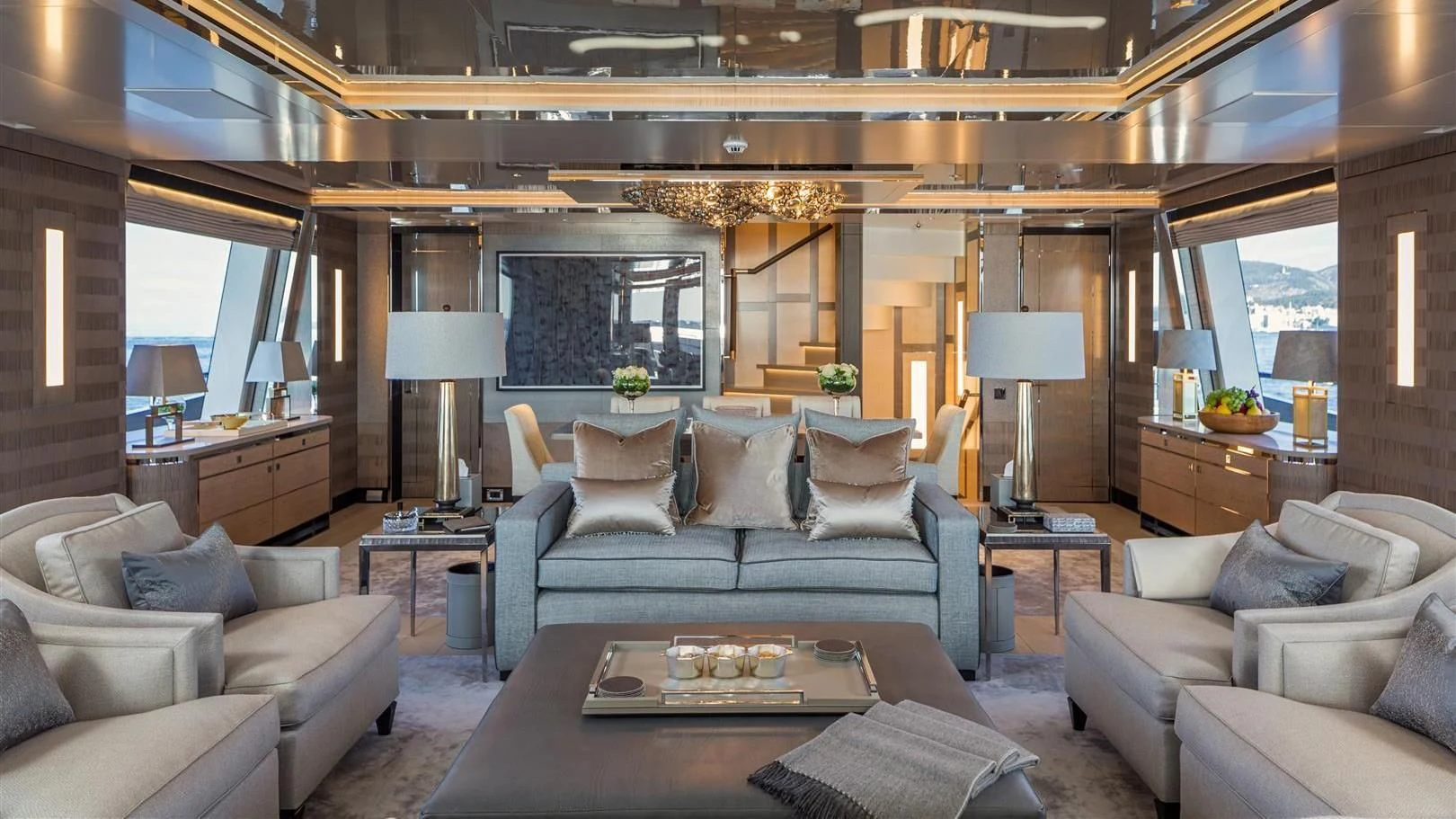 a living room with a couch and a coffee table aboard LADY VICTORIA Yacht for Sale