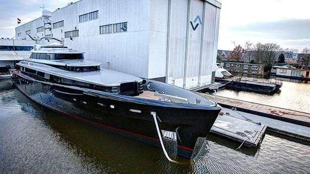 a couple of boats sit in a harbor aboard LADY VICTORIA Yacht for Sale