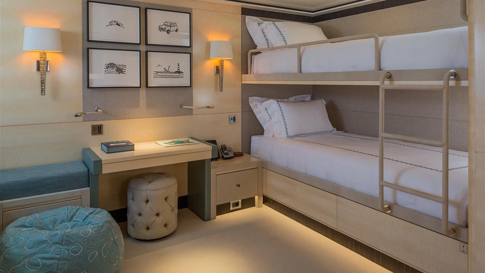 a room with a bed and a desk aboard LADY VICTORIA Yacht for Sale