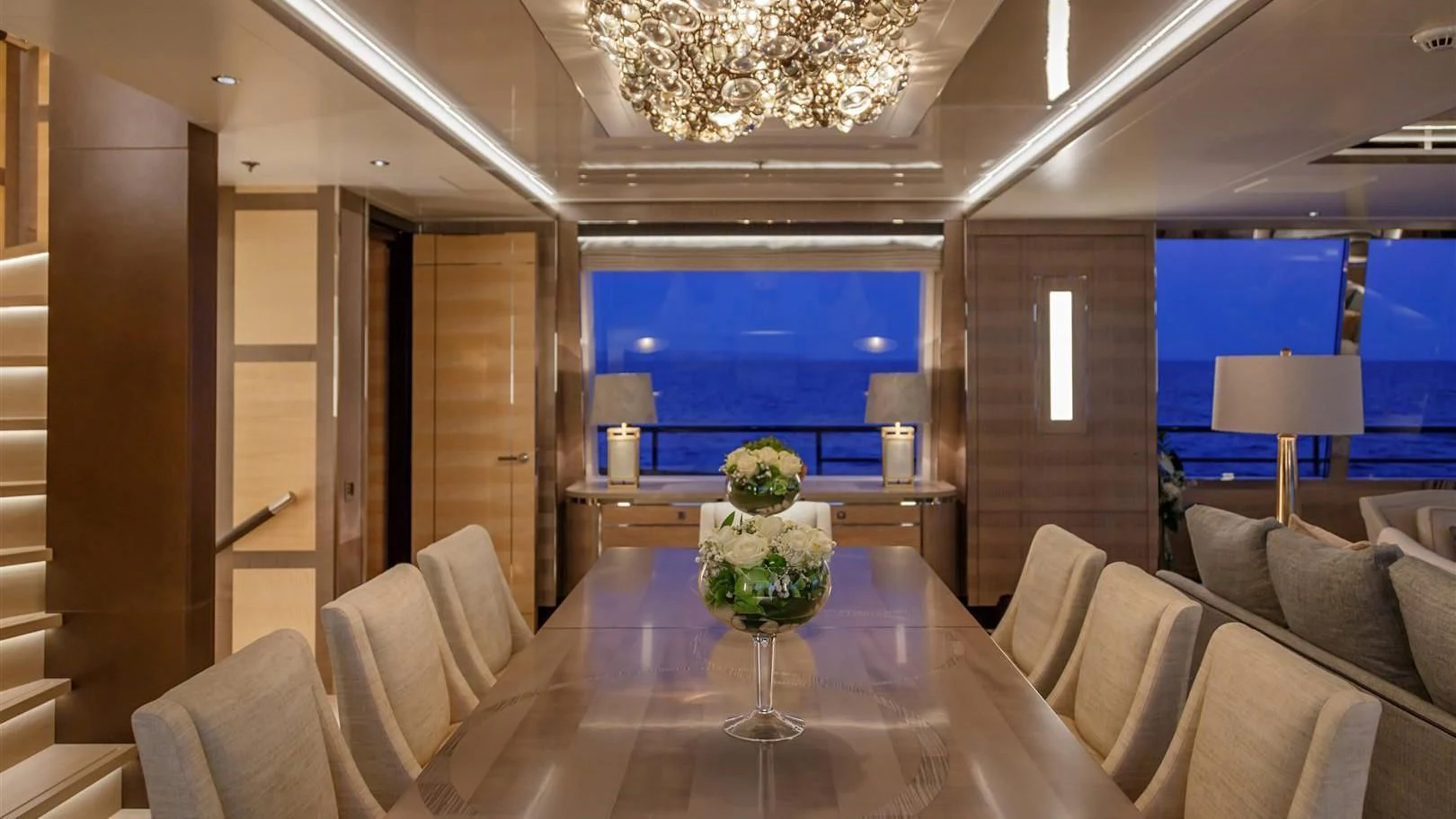 a room with a table and chairs aboard LADY VICTORIA Yacht for Sale