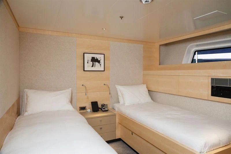 a couple of beds in a room aboard LADY VICTORIA Yacht for Sale