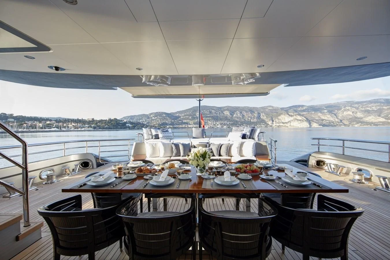 a table set for a meal on a boat aboard LADY VICTORIA Yacht for Sale