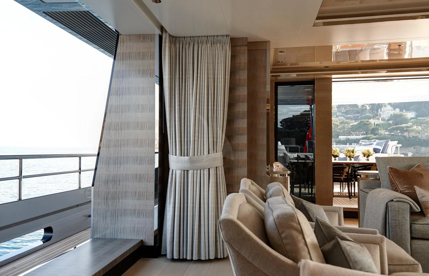 a room with a couch and a window aboard LADY VICTORIA Yacht for Sale