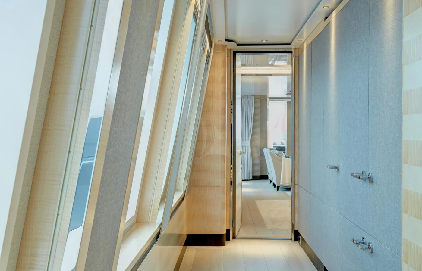 a hallway with glass doors aboard LADY VICTORIA Yacht for Sale
