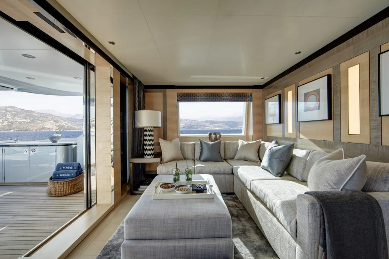 a living room with a large window aboard LADY VICTORIA Yacht for Sale