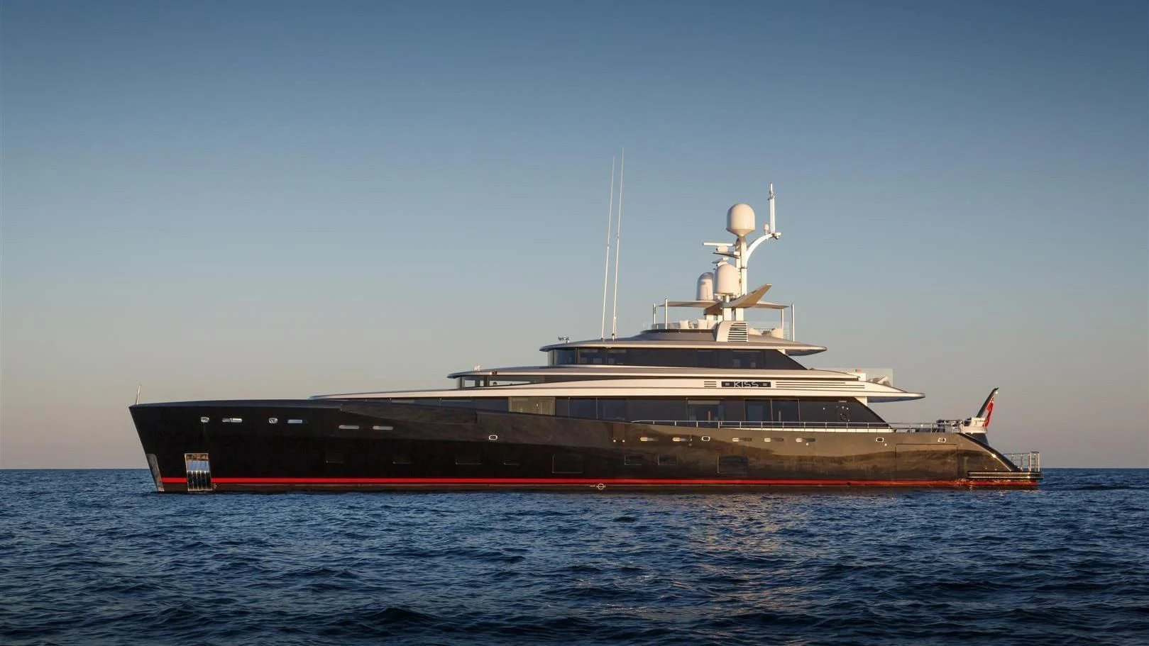 a large ship in the water aboard LADY VICTORIA Yacht for Sale