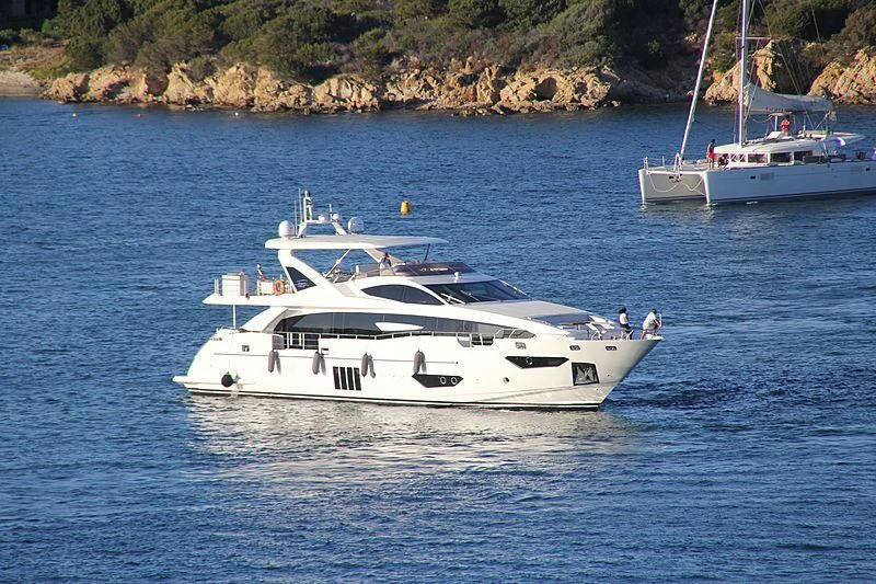 a couple of boats on the water aboard MR. FRANCISCO Yacht for Sale