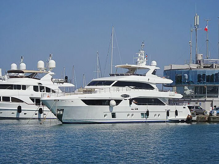 a few white yachts in the water aboard ALINA MARIA II Yacht for Sale