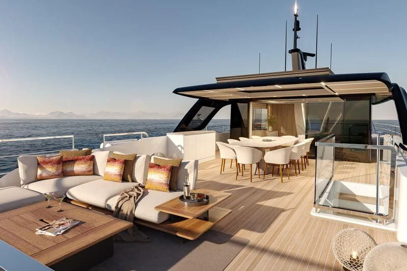 a living room with a large balcony aboard CHARISMA Yacht for Sale