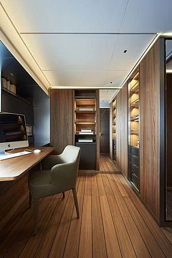 a room with a desk and a chair aboard OCEAN'S FOUR Yacht for Sale