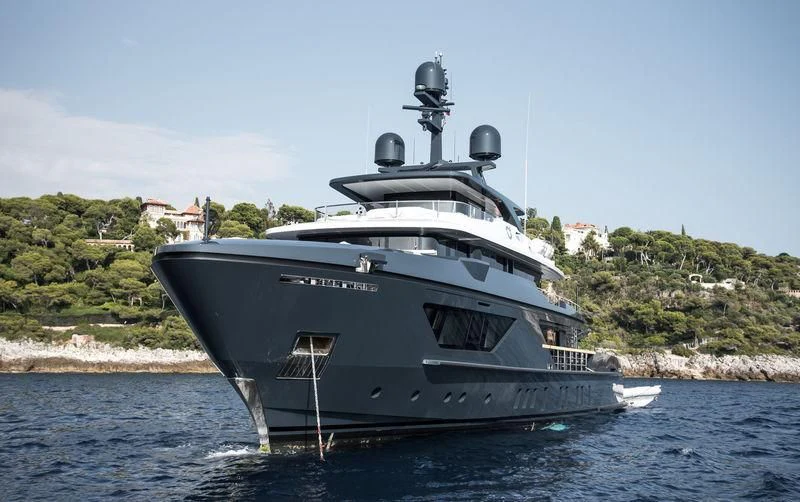 a large ship in the water aboard OCEAN'S FOUR Yacht for Sale