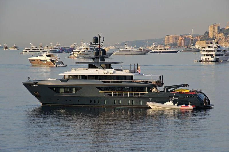 a large ship in the water aboard OCEAN'S FOUR Yacht for Sale