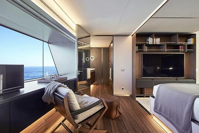 a room with a bed and a tv aboard OCEAN'S FOUR Yacht for Sale