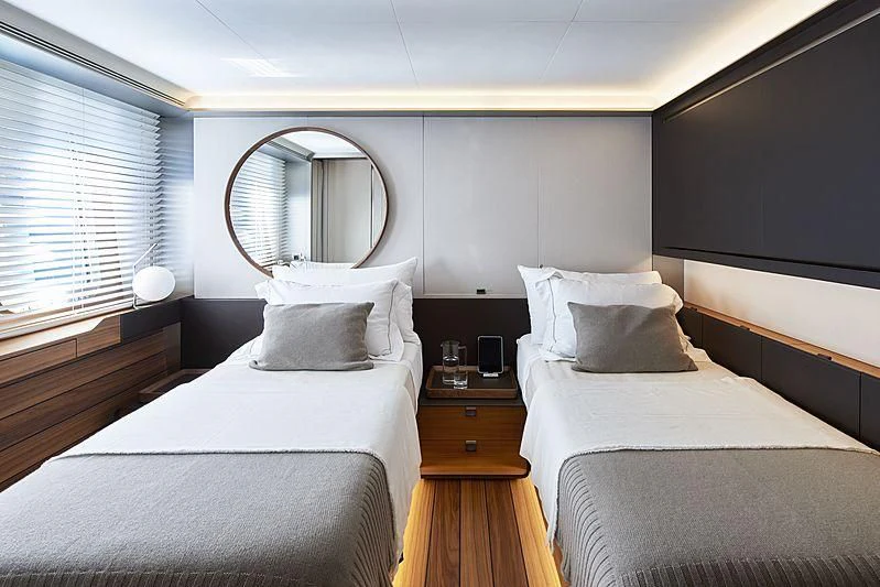 a room with two beds aboard OCEAN'S FOUR Yacht for Sale