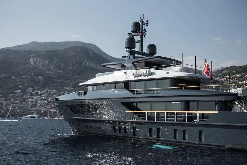 a large ship on the water aboard OCEAN'S FOUR Yacht for Sale