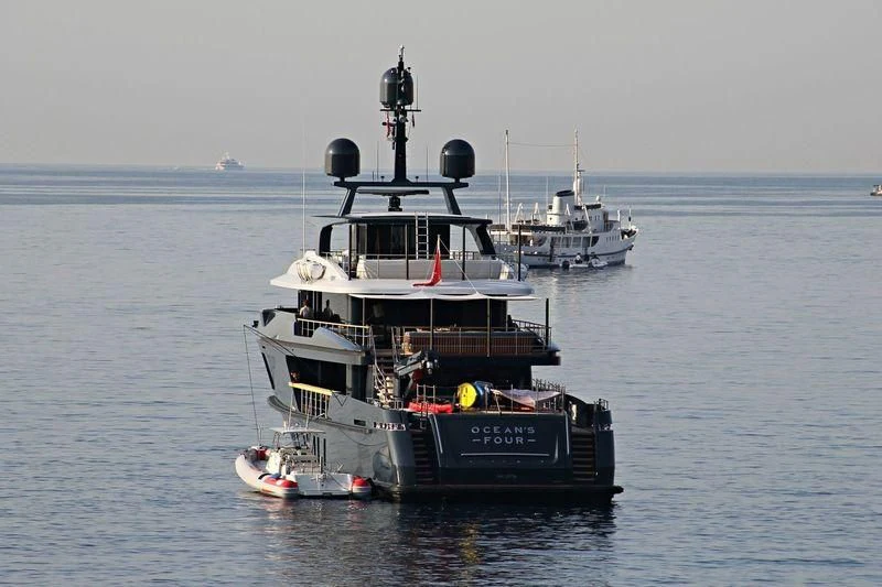 a boat in the water aboard OCEAN'S FOUR Yacht for Sale