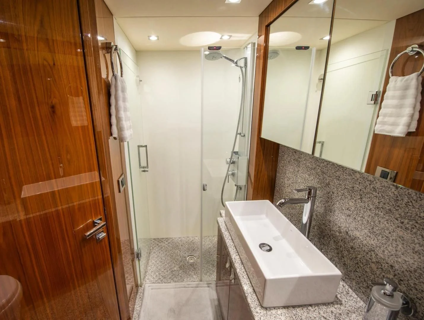 a bathroom with a marble counter top aboard LIQUIDITY Yacht for Sale