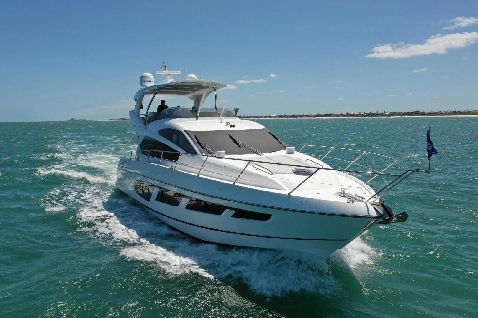a white yacht on the water aboard LIQUIDITY Yacht for Sale