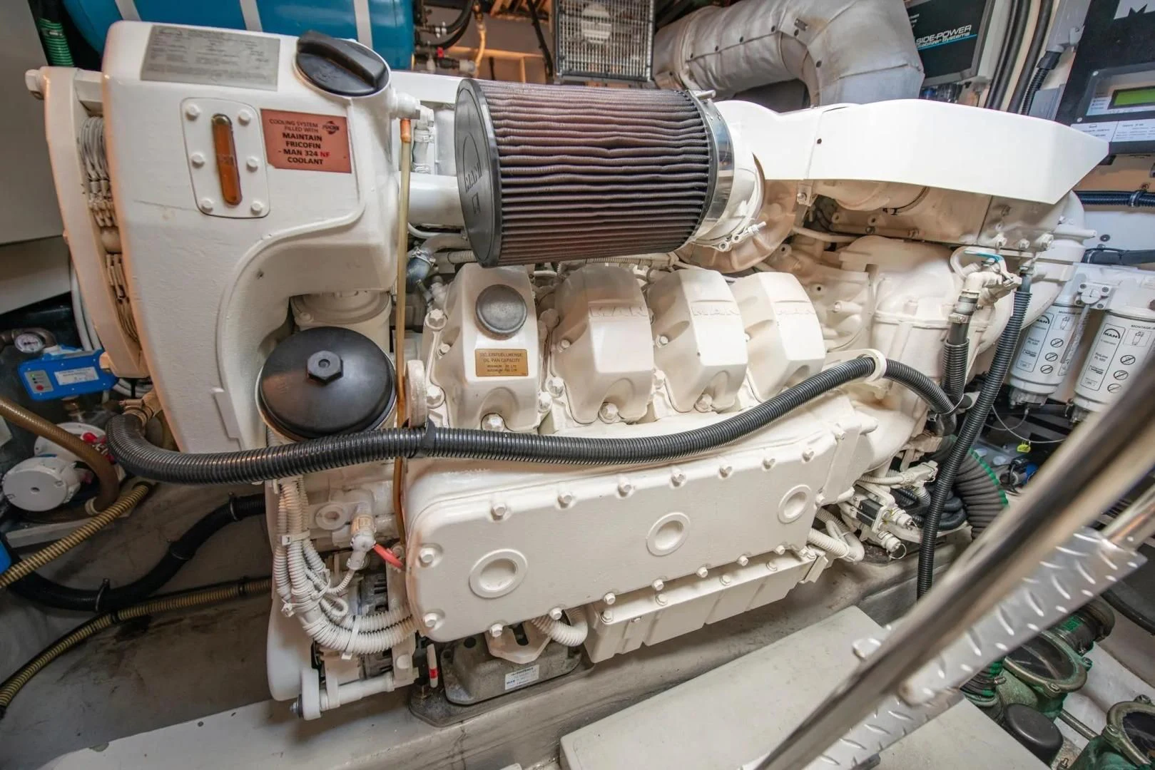 a machine with a large piece of metal aboard LIQUIDITY Yacht for Sale