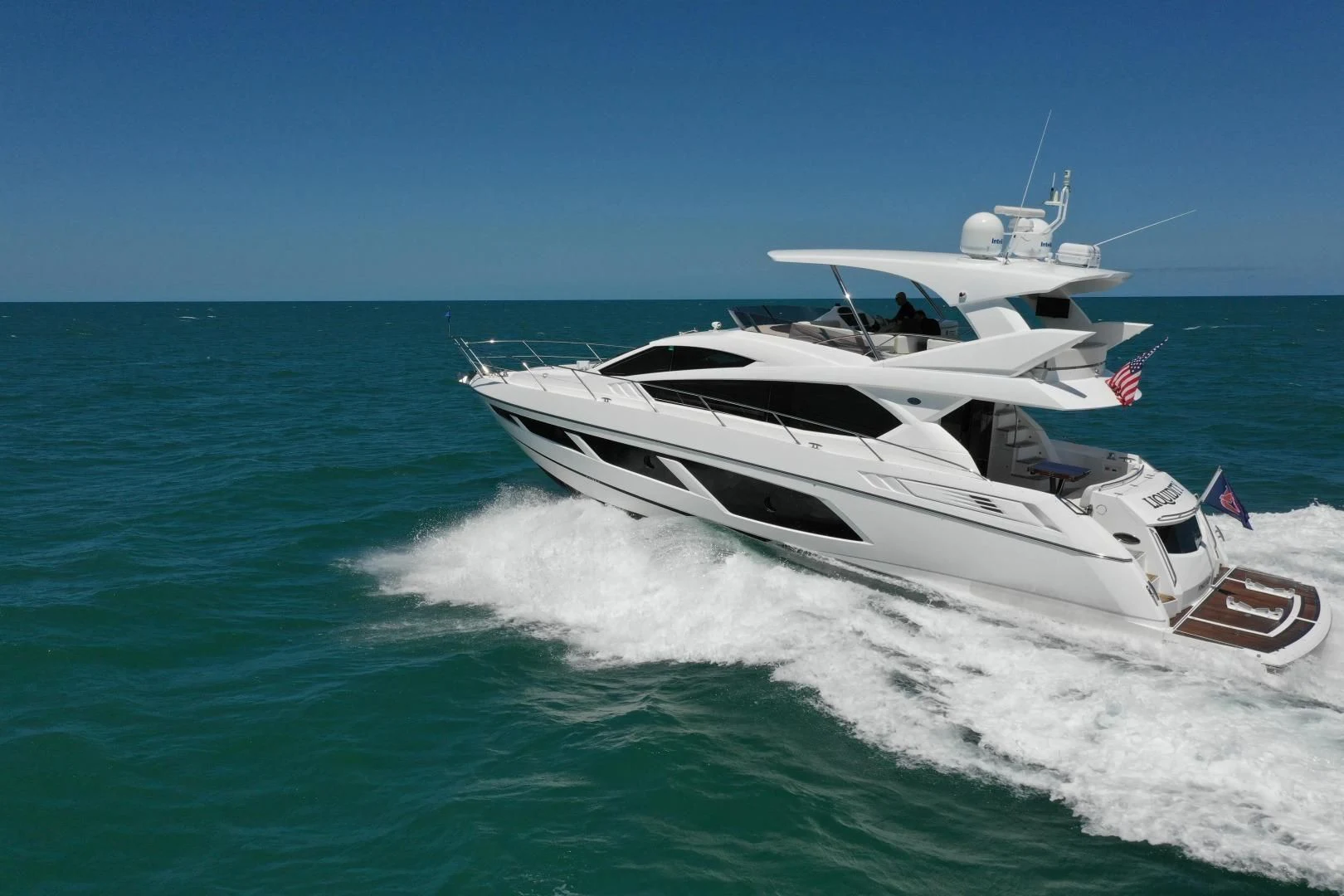a boat on the water aboard LIQUIDITY Yacht for Sale