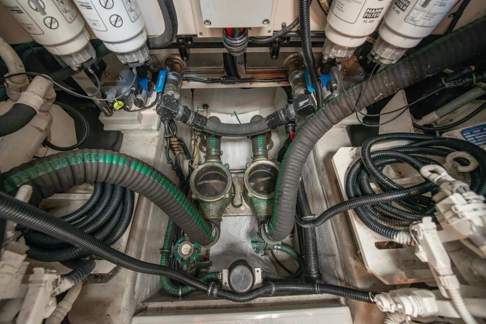 a close-up of a car engine aboard LIQUIDITY Yacht for Sale