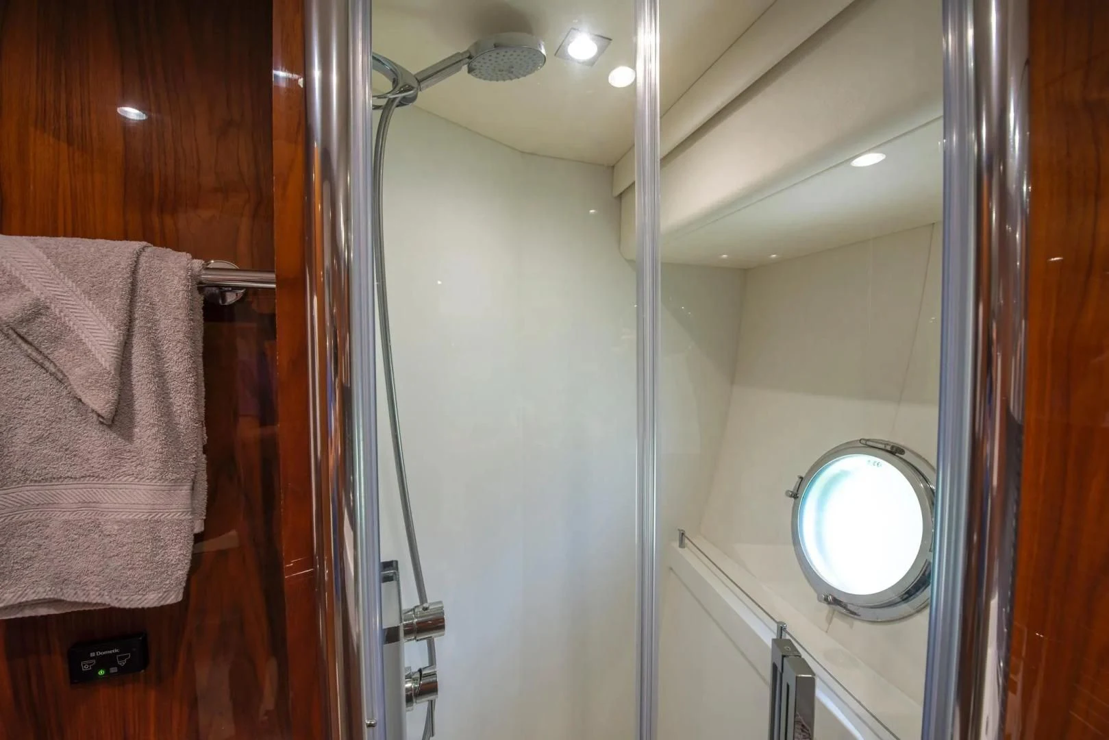 a bathroom with a mirror aboard LIQUIDITY Yacht for Sale