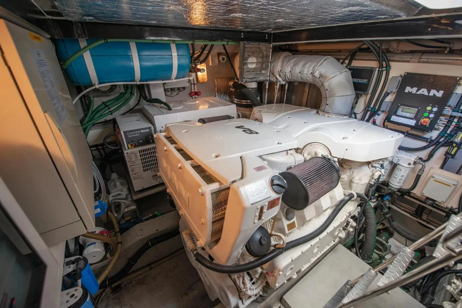 a machine with a large piece of equipment in it aboard LIQUIDITY Yacht for Sale