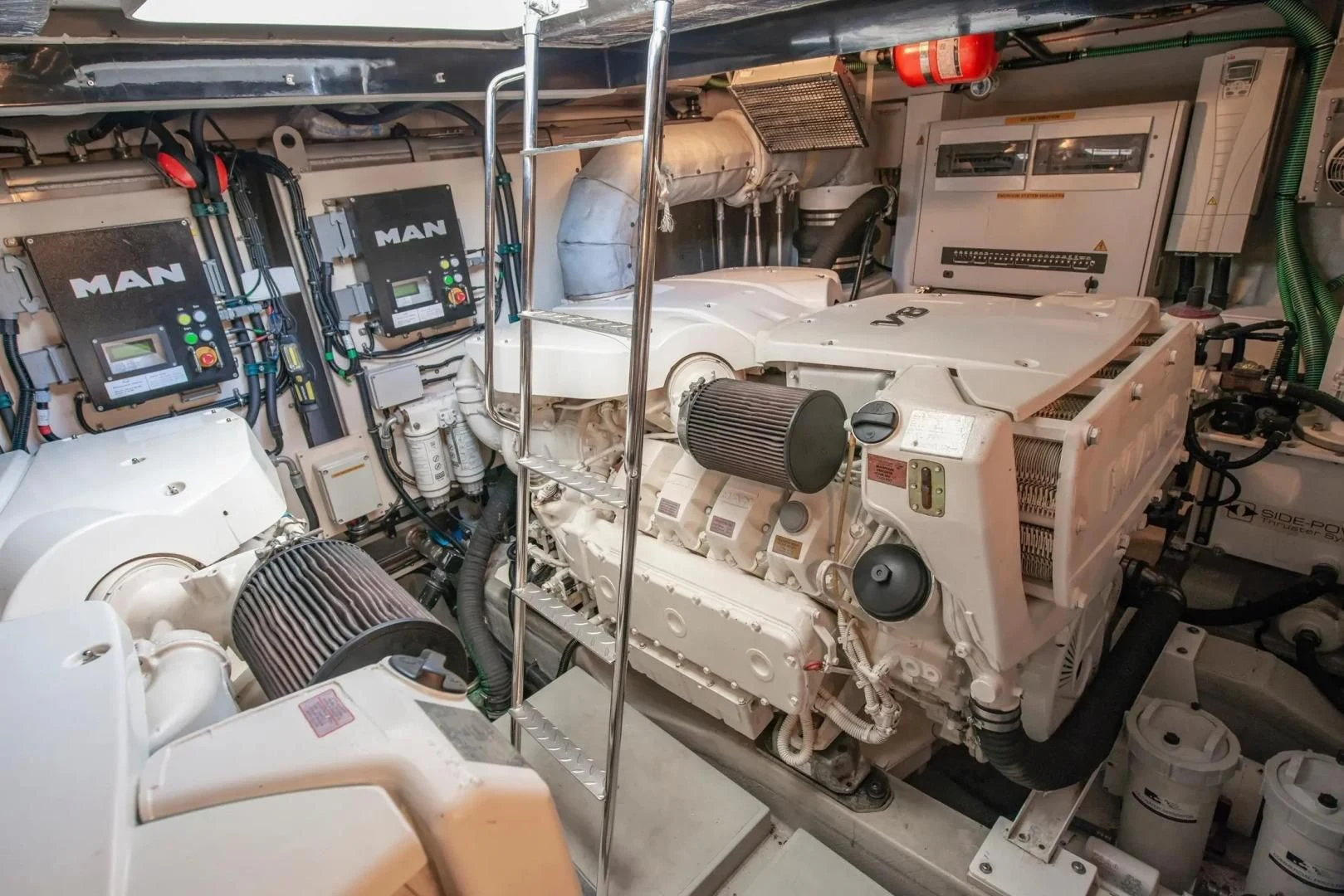 a machine with a large metal cylinder aboard LIQUIDITY Yacht for Sale
