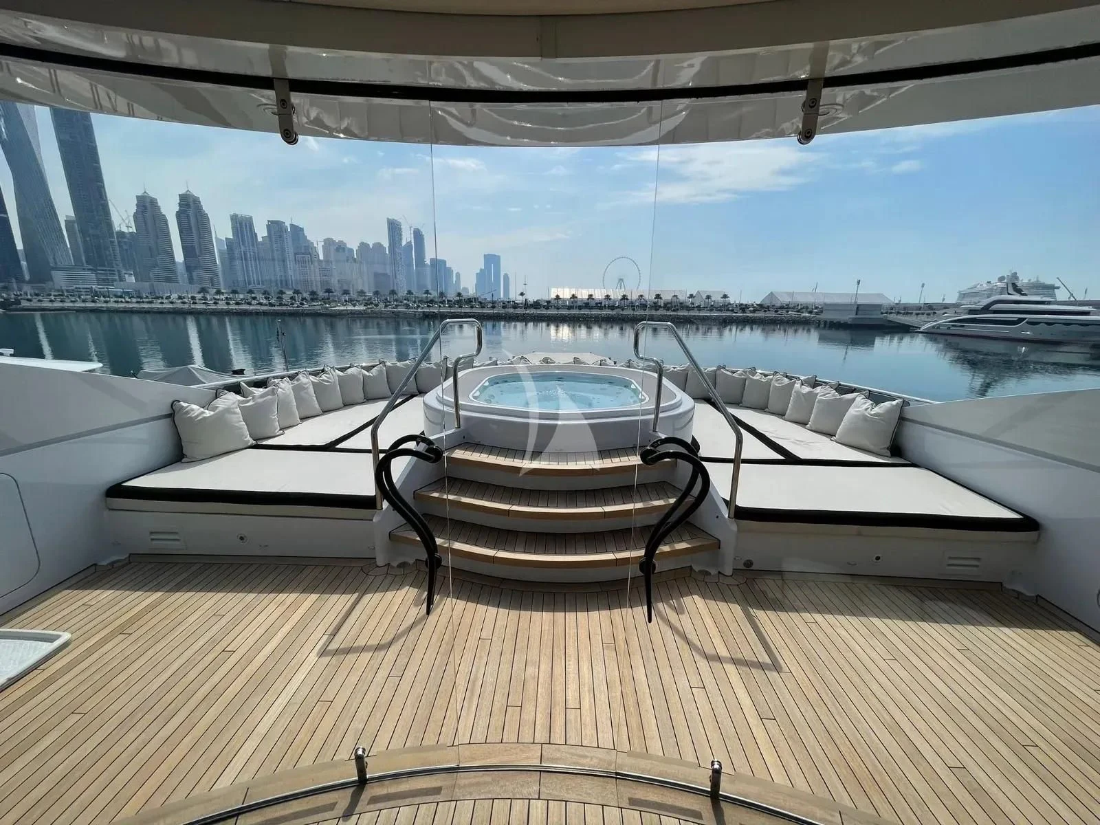 a room with a view of a city and a large window aboard ROCKET Yacht for Sale