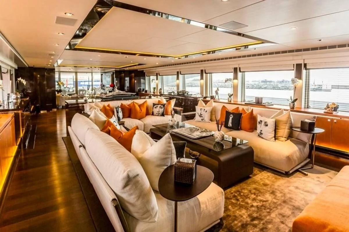 a living room with a large window aboard ROCKET Yacht for Sale
