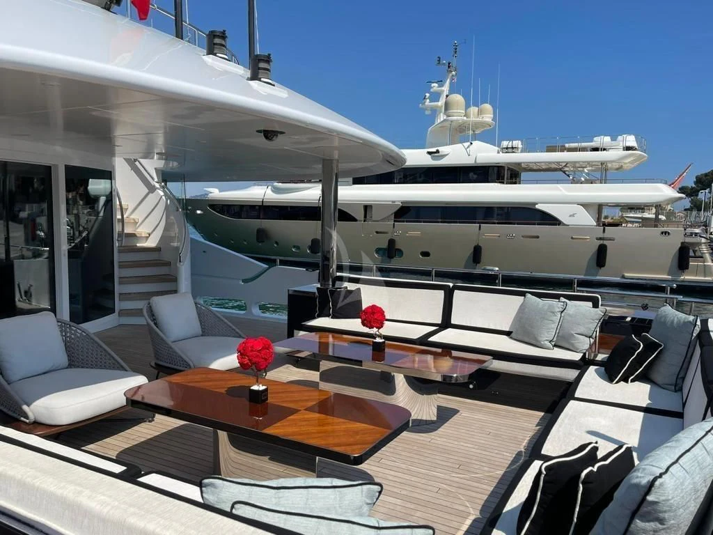 a large white yacht in a room aboard ROCKET Yacht for Sale