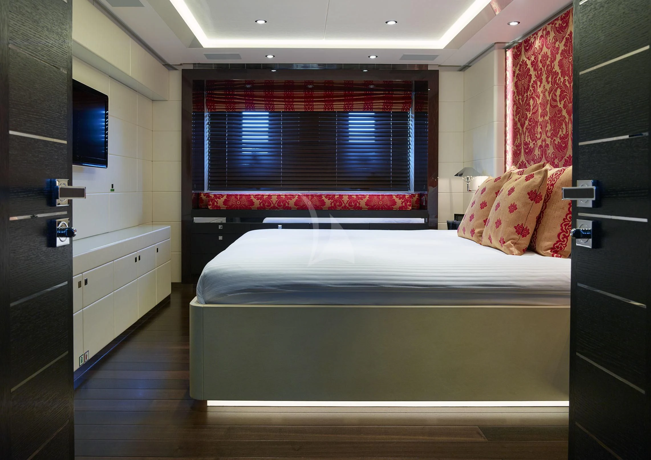 a bed in a room aboard ROCKET Yacht for Sale