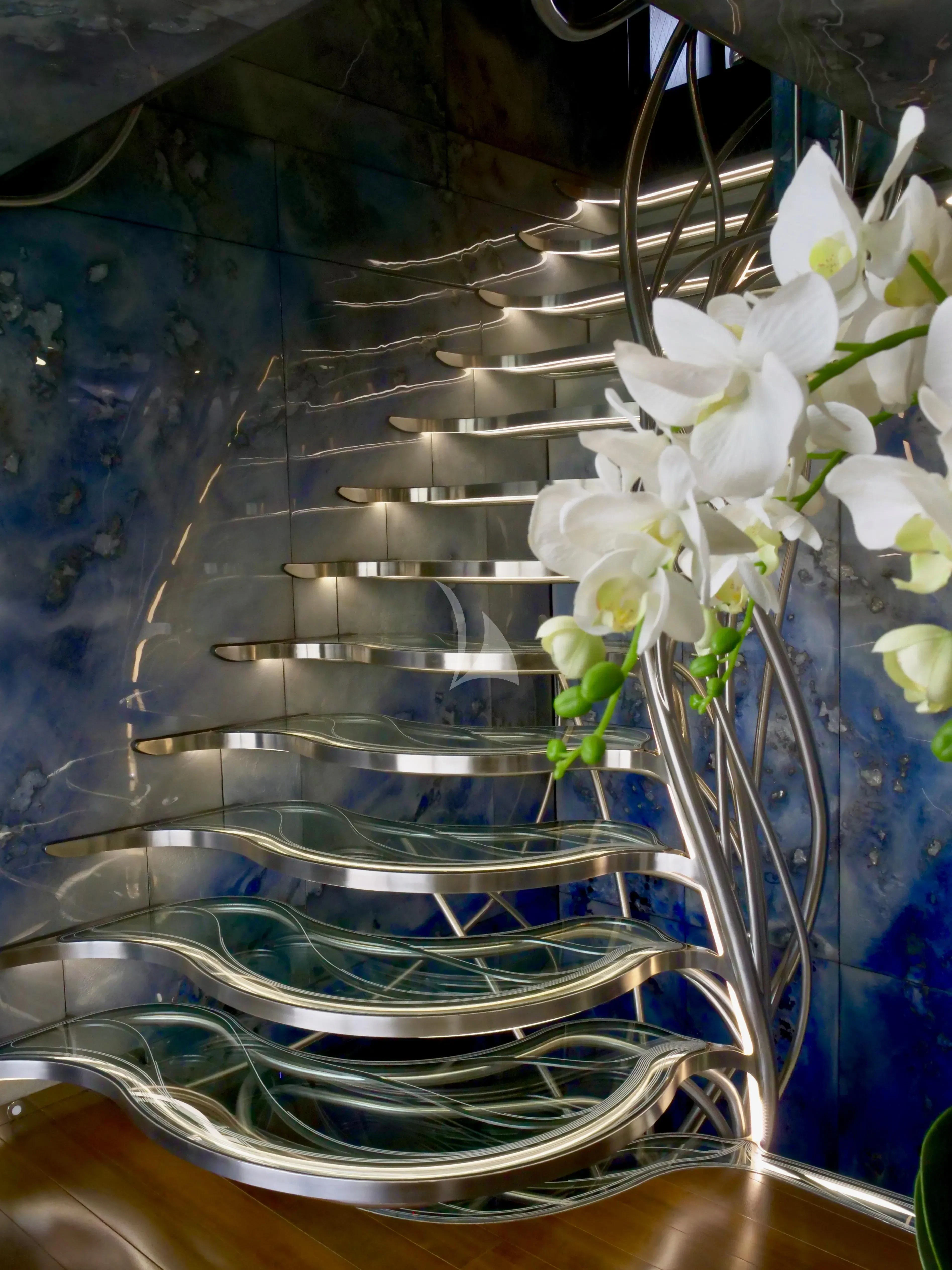 white flowers in a vase aboard ROCKET Yacht for Sale